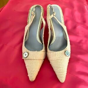 Baby pink sling back heels with pointed toes